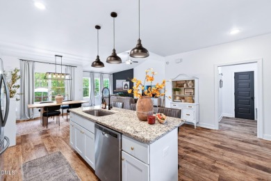 This better than new custom built 2021 home offers an open floor on River Golf and Country Club at Lake Royale in North Carolina - for sale on GolfHomes.com, golf home, golf lot