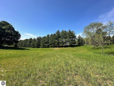 Beautiful, and lightly treed, lot overlooking the 4th fairway at on Shanty Creek Golf Course in Michigan - for sale on GolfHomes.com, golf home, golf lot
