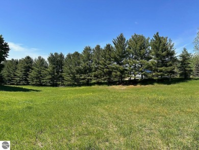 Beautiful, and lightly treed, lot overlooking the 4th fairway at on Shanty Creek Golf Course in Michigan - for sale on GolfHomes.com, golf home, golf lot