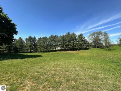 Beautiful, and lightly treed, lot overlooking the 4th fairway at on Shanty Creek Golf Course in Michigan - for sale on GolfHomes.com, golf home, golf lot