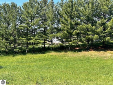 Beautiful, and lightly treed, lot overlooking the 4th fairway at on Shanty Creek Golf Course in Michigan - for sale on GolfHomes.com, golf home, golf lot