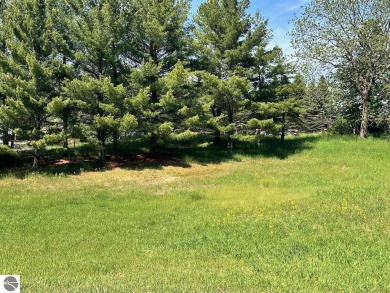 Beautiful, and lightly treed, lot overlooking the 4th fairway at on Shanty Creek Golf Course in Michigan - for sale on GolfHomes.com, golf home, golf lot
