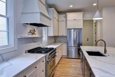 Step into timeless design and modern comfort in this newly built on Fords Colony Country Club in Virginia - for sale on GolfHomes.com, golf home, golf lot