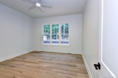 Step into timeless design and modern comfort in this newly built on Fords Colony Country Club in Virginia - for sale on GolfHomes.com, golf home, golf lot