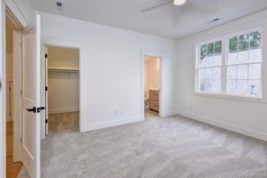 Step into timeless design and modern comfort in this newly built on Fords Colony Country Club in Virginia - for sale on GolfHomes.com, golf home, golf lot