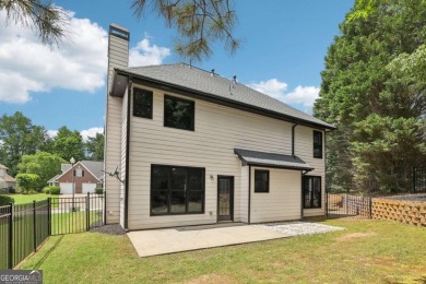 Welcome to this stunning 4-bedroom, 3.5-bath home in the on Trophy Club of Apalachee in Georgia - for sale on GolfHomes.com, golf home, golf lot