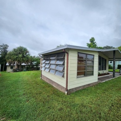 Come take a look at this home located in the GATED neighborhood on Silver Lake Executive Golf Course in Florida - for sale on GolfHomes.com, golf home, golf lot