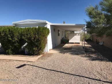 Fully renovated home on large lot in desirable west end of the on Tucson Estates Golf Course in Arizona - for sale on GolfHomes.com, golf home, golf lot