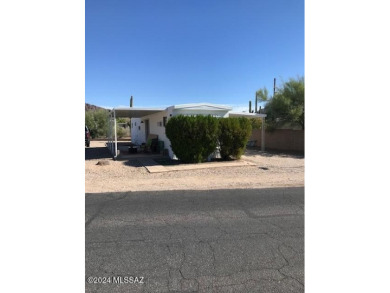 Fully renovated home on large lot in desirable west end of the on Tucson Estates Golf Course in Arizona - for sale on GolfHomes.com, golf home, golf lot