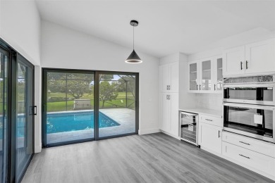Welcome to this stunning three-bedroom, three-bath home in Boca on  in Florida - for sale on GolfHomes.com, golf home, golf lot