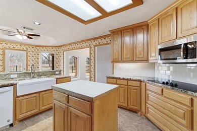 Located in the highly sought-after gated community of Pecan on Pecan Plantation Country Club in Texas - for sale on GolfHomes.com, golf home, golf lot