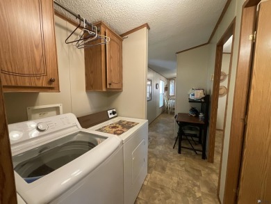 Welcome to easy living! This cozy and clean 2 bed, 2 bath on Butterfield Golf Course in Arizona - for sale on GolfHomes.com, golf home, golf lot