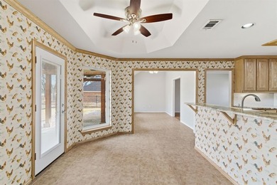 Located in the highly sought-after gated community of Pecan on Pecan Plantation Country Club in Texas - for sale on GolfHomes.com, golf home, golf lot