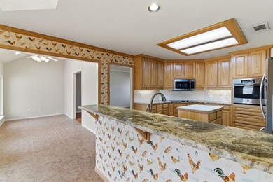 Located in the highly sought-after gated community of Pecan on Pecan Plantation Country Club in Texas - for sale on GolfHomes.com, golf home, golf lot