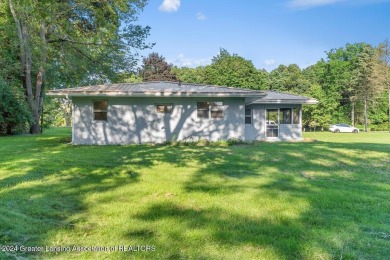 This beautifully renovated 3-bedroom, 1-bathroom residence is on Grande Golf Club in Michigan - for sale on GolfHomes.com, golf home, golf lot