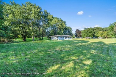 This beautifully renovated 3-bedroom, 1-bathroom residence is on Grande Golf Club in Michigan - for sale on GolfHomes.com, golf home, golf lot