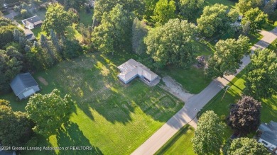 This beautifully renovated 3-bedroom, 1-bathroom residence is on Grande Golf Club in Michigan - for sale on GolfHomes.com, golf home, golf lot