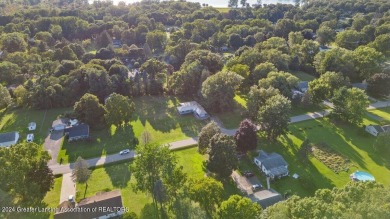 This beautifully renovated 3-bedroom, 1-bathroom residence is on Grande Golf Club in Michigan - for sale on GolfHomes.com, golf home, golf lot