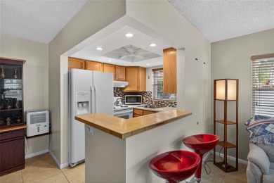 Welcome to this beautifully updated 1-bedroom, 1.5-bath on Hillsboro Pines Golf in Florida - for sale on GolfHomes.com, golf home, golf lot