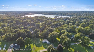 This beautifully renovated 3-bedroom, 1-bathroom residence is on Grande Golf Club in Michigan - for sale on GolfHomes.com, golf home, golf lot