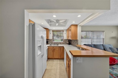 Welcome to this beautifully updated 1-bedroom, 1.5-bath on Hillsboro Pines Golf in Florida - for sale on GolfHomes.com, golf home, golf lot