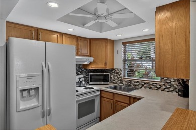 Welcome to this beautifully updated 1-bedroom, 1.5-bath on Hillsboro Pines Golf in Florida - for sale on GolfHomes.com, golf home, golf lot