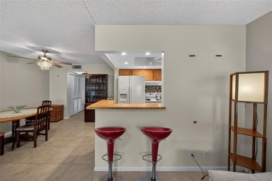 Welcome to this beautifully updated 1-bedroom, 1.5-bath on Hillsboro Pines Golf in Florida - for sale on GolfHomes.com, golf home, golf lot