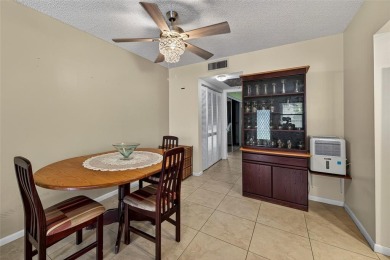 Welcome to this beautifully updated 1-bedroom, 1.5-bath on Hillsboro Pines Golf in Florida - for sale on GolfHomes.com, golf home, golf lot