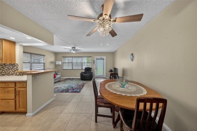 Welcome to this beautifully updated 1-bedroom, 1.5-bath on Hillsboro Pines Golf in Florida - for sale on GolfHomes.com, golf home, golf lot