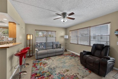 Welcome to this beautifully updated 1-bedroom, 1.5-bath on Hillsboro Pines Golf in Florida - for sale on GolfHomes.com, golf home, golf lot