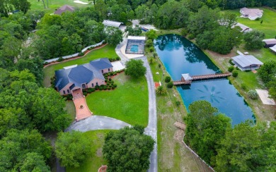 Welcome to your own private estate -- a true masterpiece of on Quail Heights Golf and Country Club in Florida - for sale on GolfHomes.com, golf home, golf lot