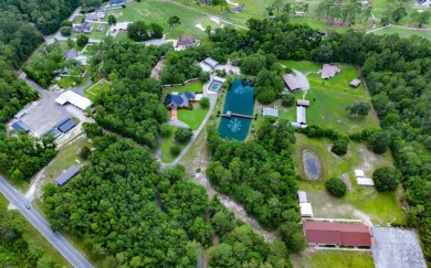 Welcome to your own private estate -- a true masterpiece of on Quail Heights Golf and Country Club in Florida - for sale on GolfHomes.com, golf home, golf lot