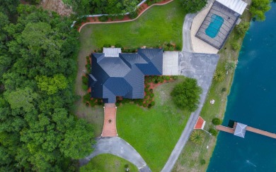Welcome to your own private estate -- a true masterpiece of on Quail Heights Golf and Country Club in Florida - for sale on GolfHomes.com, golf home, golf lot