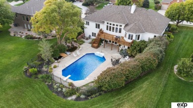 Luxury meets comfort in this stunning custom brick ranch backing on Tiburon Golf Club in Nebraska - for sale on GolfHomes.com, golf home, golf lot