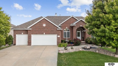 Luxury meets comfort in this stunning custom brick ranch backing on Tiburon Golf Club in Nebraska - for sale on GolfHomes.com, golf home, golf lot