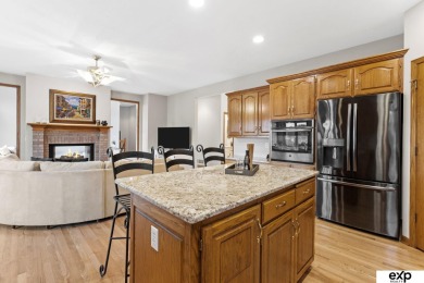 Luxury meets comfort in this stunning custom brick ranch backing on Tiburon Golf Club in Nebraska - for sale on GolfHomes.com, golf home, golf lot