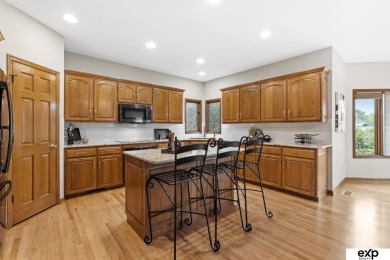 Luxury meets comfort in this stunning custom brick ranch backing on Tiburon Golf Club in Nebraska - for sale on GolfHomes.com, golf home, golf lot