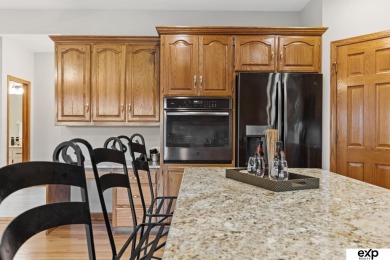 Luxury meets comfort in this stunning custom brick ranch backing on Tiburon Golf Club in Nebraska - for sale on GolfHomes.com, golf home, golf lot
