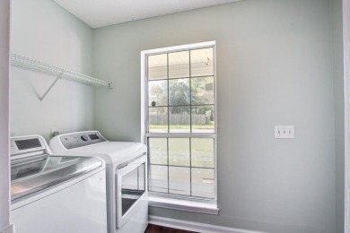 Discover this charming home nestled in one of Goose Creek's most on Crowfield Golf and Country Club in South Carolina - for sale on GolfHomes.com, golf home, golf lot