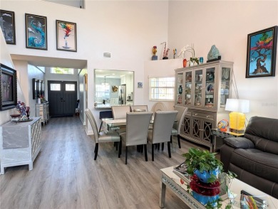 Enjoy this Beautiful two-story pool home, in the private and on The Grand Club - Pine Lakes Course in Florida - for sale on GolfHomes.com, golf home, golf lot