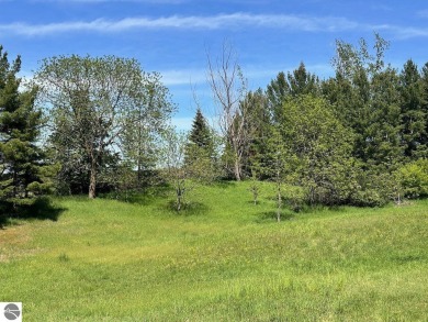 Beautiful, and lightly treed, lot overlooks the 4th fairway at on Shanty Creek Golf Course in Michigan - for sale on GolfHomes.com, golf home, golf lot