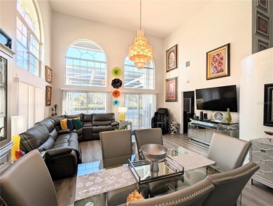 Enjoy this Beautiful two-story pool home, in the private and on The Grand Club - Pine Lakes Course in Florida - for sale on GolfHomes.com, golf home, golf lot
