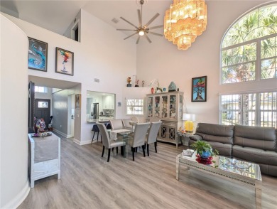 Enjoy this Beautiful two-story pool home, in the private and on The Grand Club - Pine Lakes Course in Florida - for sale on GolfHomes.com, golf home, golf lot