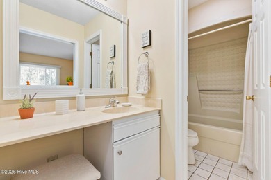 Discover your perfect retreat in this beautifully appointed on Oyster Bay Golf Links in North Carolina - for sale on GolfHomes.com, golf home, golf lot