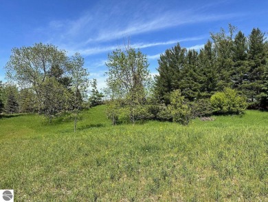 Beautiful, and lightly treed, lot overlooks the 4th fairway at on Shanty Creek Golf Course in Michigan - for sale on GolfHomes.com, golf home, golf lot