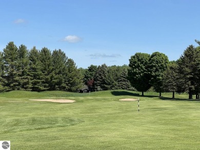 Beautiful, and lightly treed, lot overlooks the 4th fairway at on Shanty Creek Golf Course in Michigan - for sale on GolfHomes.com, golf home, golf lot