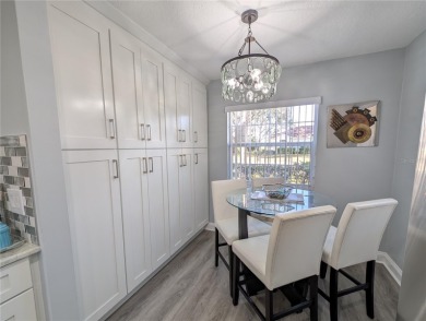 Enjoy this Beautiful two-story pool home, in the private and on The Grand Club - Pine Lakes Course in Florida - for sale on GolfHomes.com, golf home, golf lot
