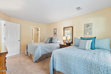 Discover your perfect retreat in this beautifully appointed on Oyster Bay Golf Links in North Carolina - for sale on GolfHomes.com, golf home, golf lot