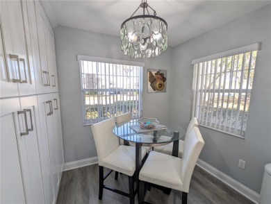 Enjoy this Beautiful two-story pool home, in the private and on The Grand Club - Pine Lakes Course in Florida - for sale on GolfHomes.com, golf home, golf lot