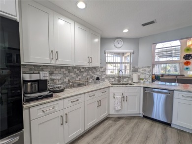 Enjoy this Beautiful two-story pool home, in the private and on The Grand Club - Pine Lakes Course in Florida - for sale on GolfHomes.com, golf home, golf lot
